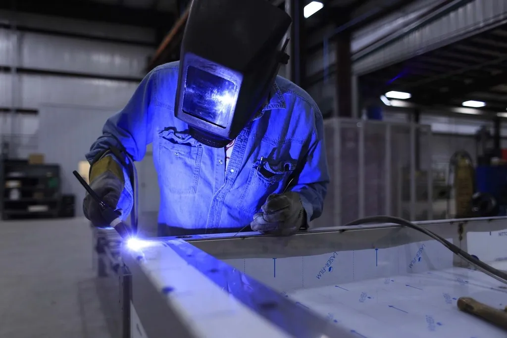 Welder at work in a workshop
